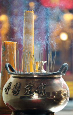 Candles and incense clouds, Wat Mongkorn, Chinatown, Bangkok