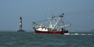 His and Hers shrimp boat near the lighthouse