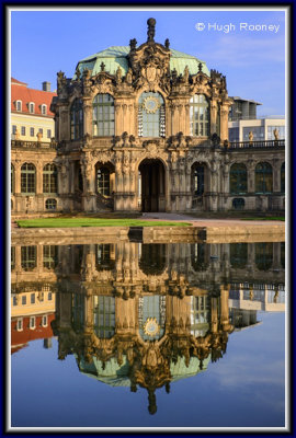 Dresden - Zwinger Palace - Glockenspiel Pavilion reflected in pool. 