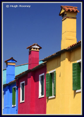 Venice - Burano Island - Colourful house facades. 