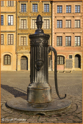  Warsaw - Old Town Square - West side with 19th century iron water pump 
