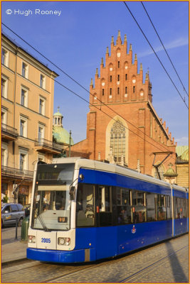  Krakow - Dominican Church with city tram. 
