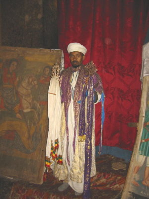 A priest displaying some more crosses of Lalibela