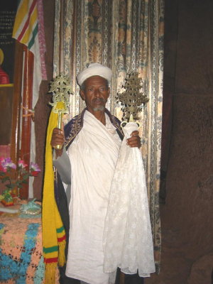 Priest showing a couple of Lalibela crosses