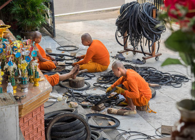 Monks recyling cyling weels.