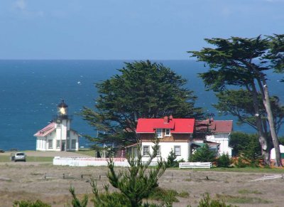 Residence and Lit Lighthouse