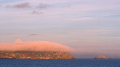 Nare Head clutching a cloud