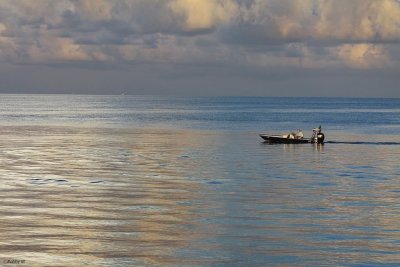  Lone fisherman at sea