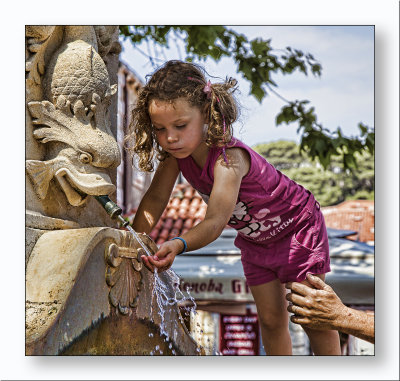 Young Girl At Fountain