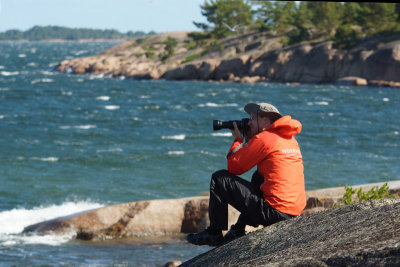 Greger fotograferar