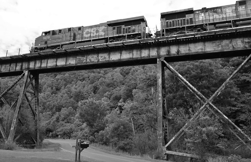 A Westbound CSX stone train crosses Bootleggers trestle near Sunbright Va 