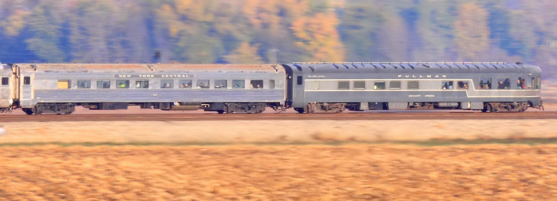 A pair of NYC cars including the Hickory Creek Obs bring up the rear of the train near Roanoke 