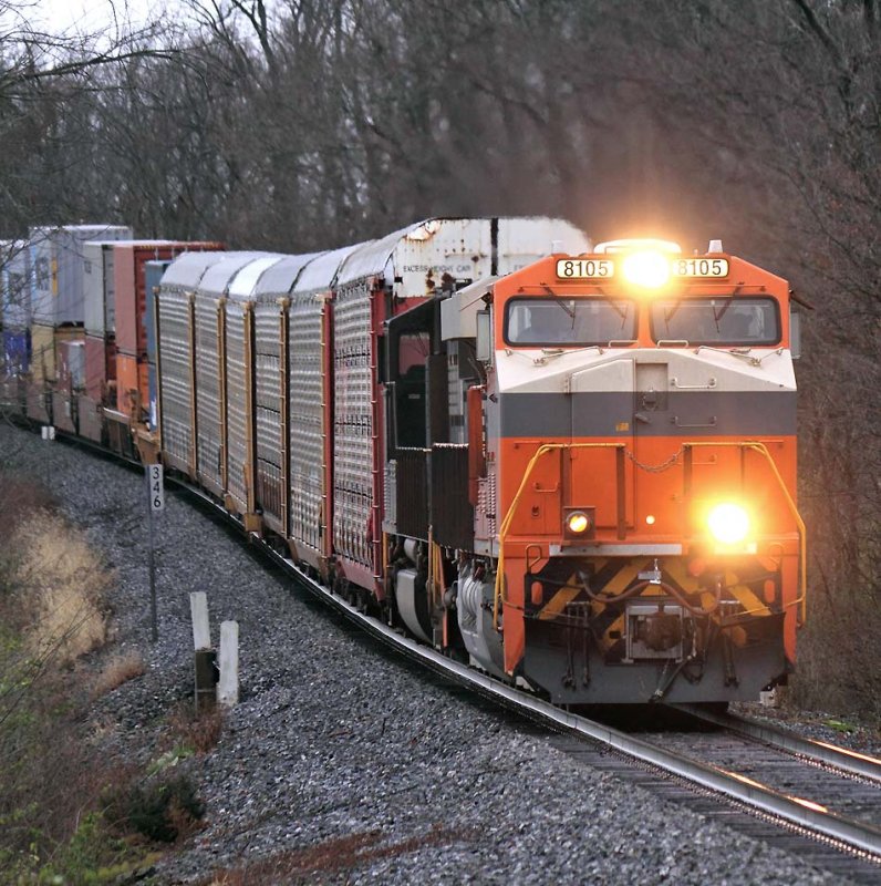 Eastbound  23G drops down off the hill at Convoy, KY with the Interstate 8105 leading 