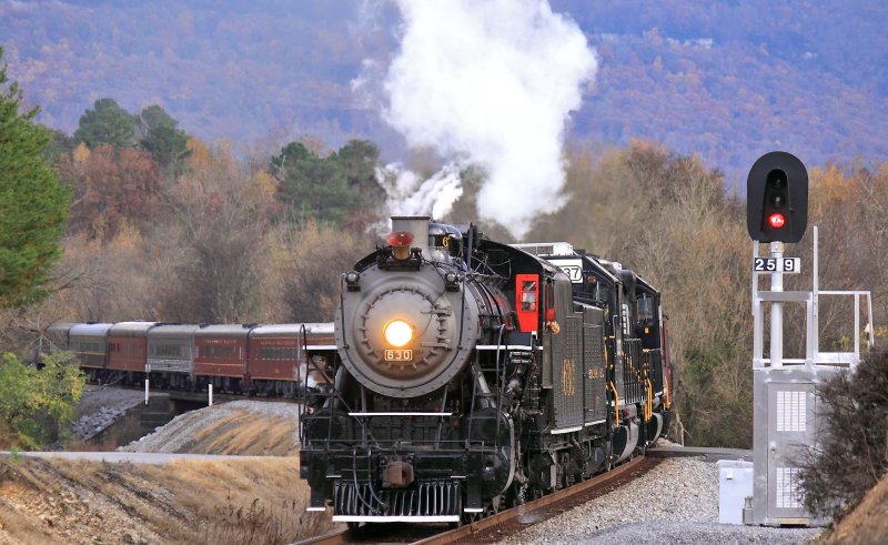 The train wraps around the big curve South of Rising Fawn after a stop to inspect the engine 