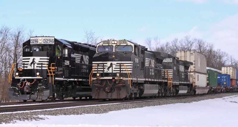 Train 289 (on the left) waits on a Louisville crew to board as Southbound 229 passes them on #1 track at North Wye 