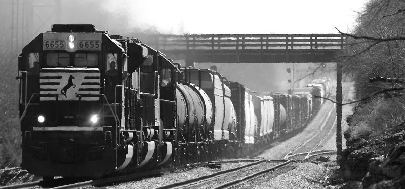 NS 6655 leads a all EMD 116 North under the Buster Pike bridge at CP North Wye 