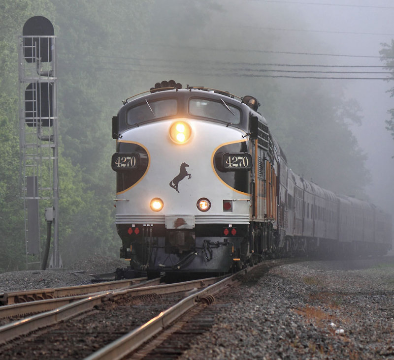 The NS OCS climbs out of the fog at Robbins, TN 