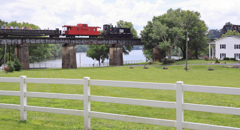 A K&HR Baseball train crosses the Holston River Bridge near Marbledale, TN 