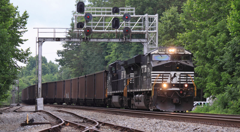 Northbound 75J comes under the searchlight signals at Phillips the day before they were removed from service 