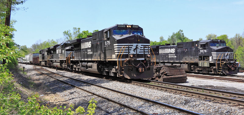 NS 111 passes a Bad Order D9 at West Waddy 