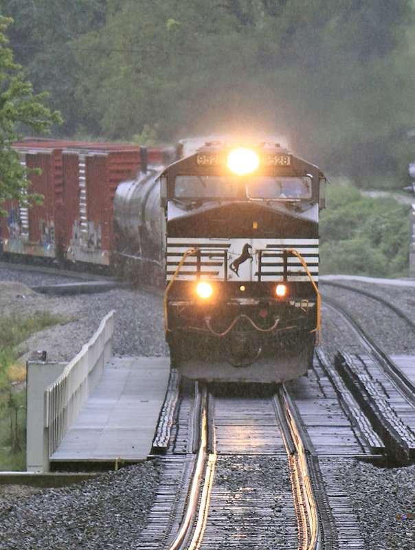 111 crosses the new Pittman Creek bridge in the rain 