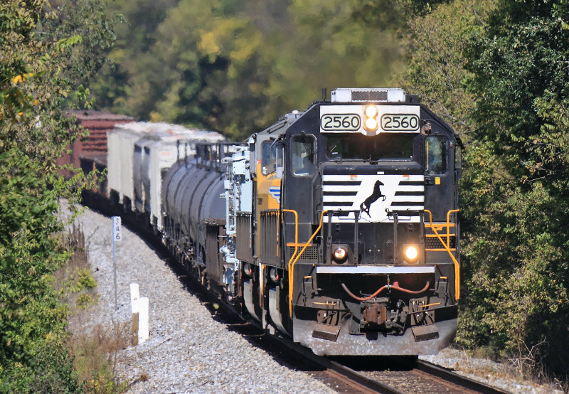 Eastbound 167 comes through the dip at Convoy behind a spartan Cab SD70 