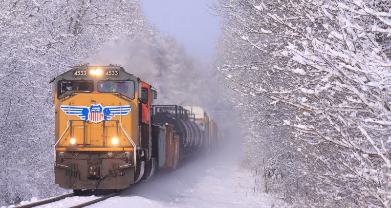 NA M67 climbs out of the Benson Creek Valley on a cold winter morning 