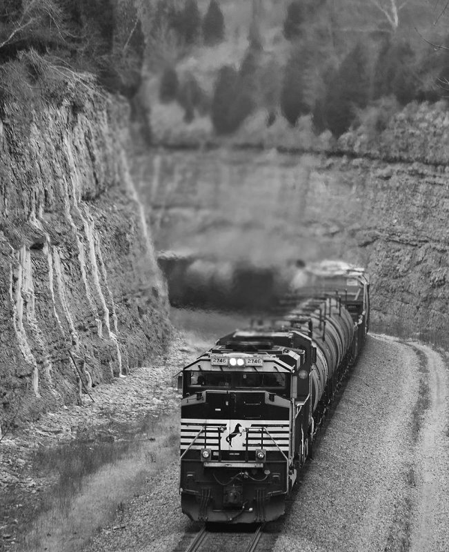 111 climbs through the cut at Kings Mountain on a cold, windy morning. 