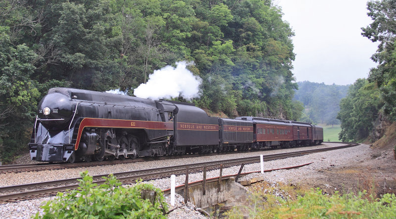 611 is near the wye at Walton as the sun pops out....ever so briefly. 