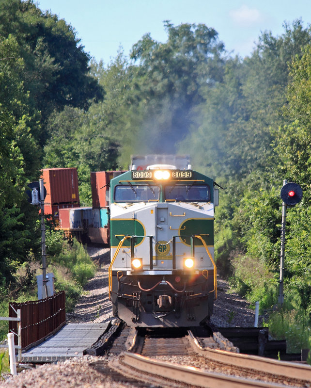 SOUTHERN 8099 passes the GRS signals at Salvisa with Westbound train 22A 