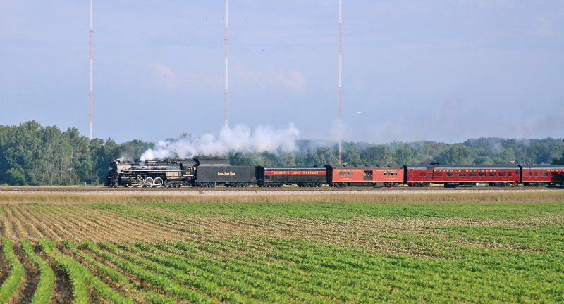 NKP 765 roars through Roanoke (Indiana) on a warm Saturday morning, Westbound on the old Wabash 