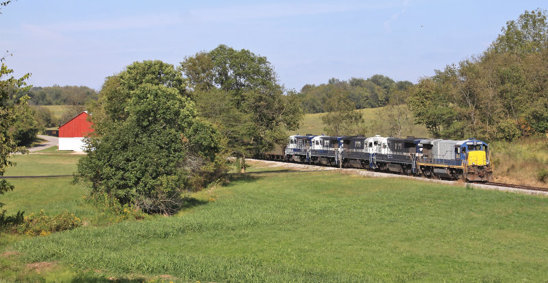 TTI 5808, still in CSX paint, leads a 151 car empty train South at Strodes Mill 