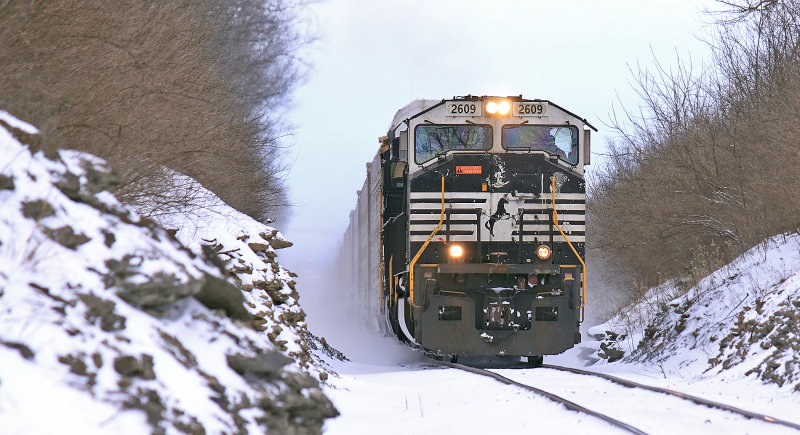 Westbound 273 in the snow covered cut at Convoy 