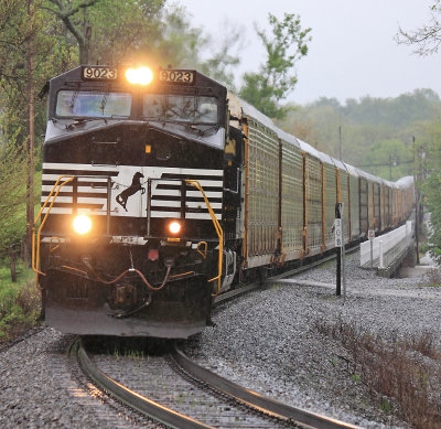 Train 289 crosses the bridge at Shelbyville, starting to pinch them down for a meet at Joyes