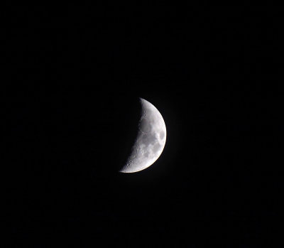 Crescent moon on a stormy night. 