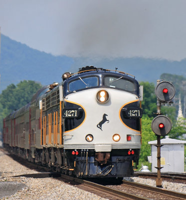 The short mast searchlight signals are still standing as NS 955 sprints South at Spring City 