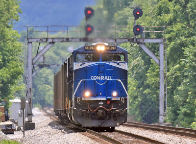 CR 8098 brings a Northbound empty coal train under the endangered signal bridge at Geneva Ky 