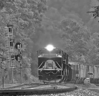 Wabash 1070 brings train 142 off of Kings Mountain during a strong summer storm 