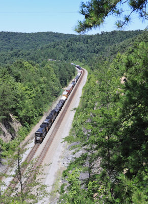 Train 177 grinds uphill towards KD tower, as seen from the Cave Springs bridge at Keno 