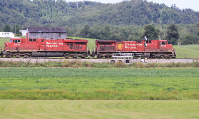 A crusty looking Beaver boat leads NS 116 by the signals at Bowen 