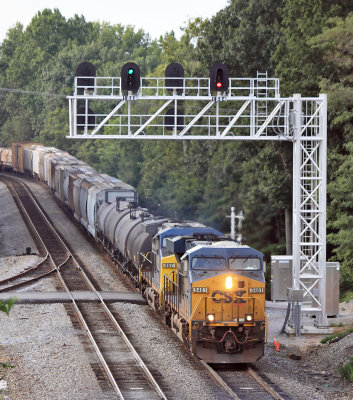 NS 143 at Southern States near Somerset...Ugly CSX power and ugly new signals