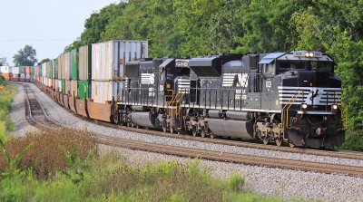A nice pair of EMD's are shouting and singing as they drag 285 over the top of the hill at Waddy 
