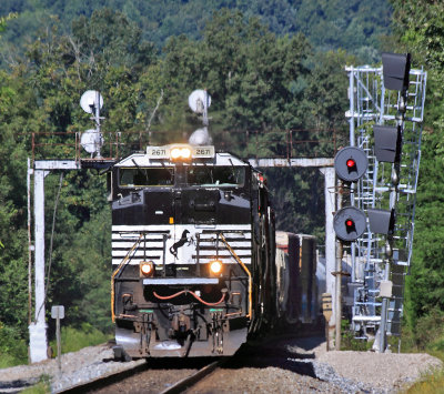 A Southbound manifest passes Two generations of signals and whistle post at Southfork 