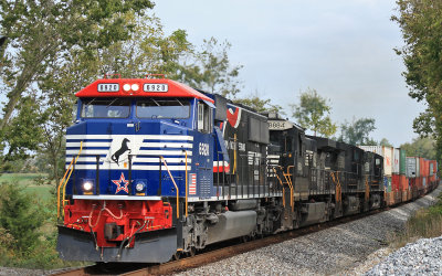 Eastbound 376 comes through the big dip at Convoy Ky with the 6920 on the point 