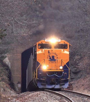 CNJ 1071 leads a 69V empty rock train at Ridgecrest, North Carolina 
