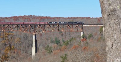 The first steam trip since 1994 soars across the New River bridge on the CNO&TP 