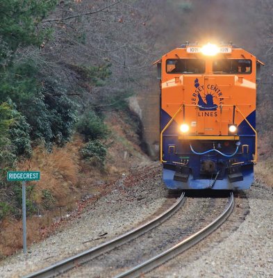 CNJ 1071 brings train 69V out of the tunnel at Ridgecrest NC as they top over the grade from Old Fort 