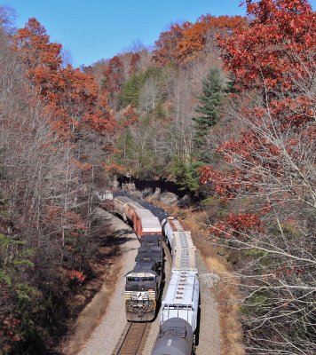 Southbound M-17 passes through the cut just North of Pilot Mountain, meeting a Northbound that was down to a crawl on the grade
