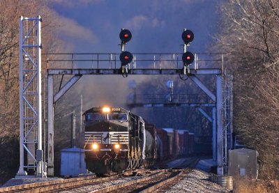 Northbound 168 rolls through the interlocking at Geneva as the shadows start to creep into the valley 