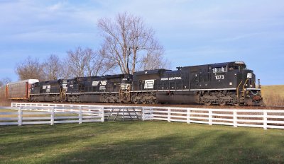 Penn Central 1073 leads NS 23G at Vanarsdale Ky on the Louisville District 